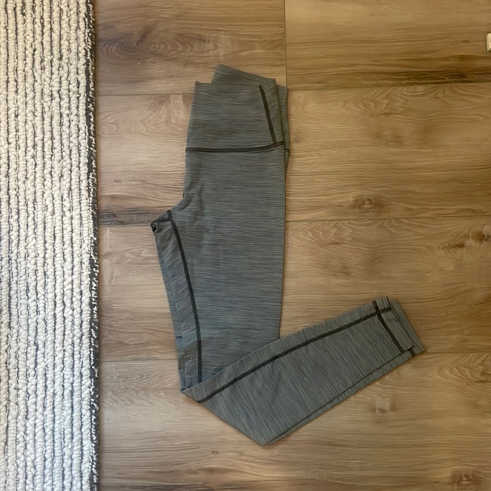 Sage green, black, and white leggings size 4